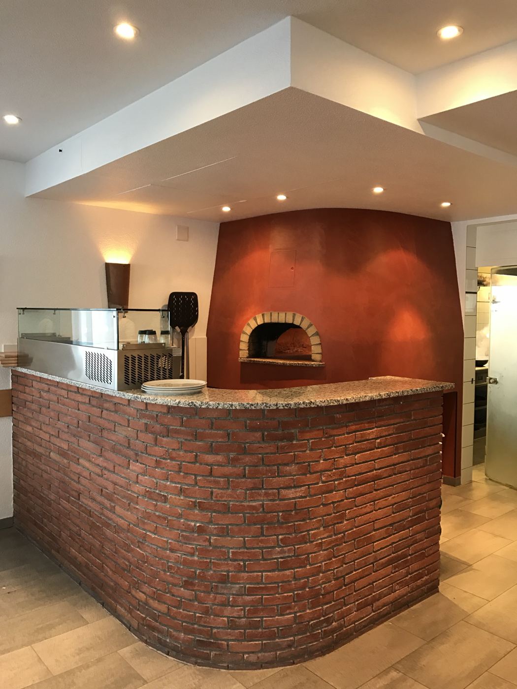 Four à pizza, enduit terracotta